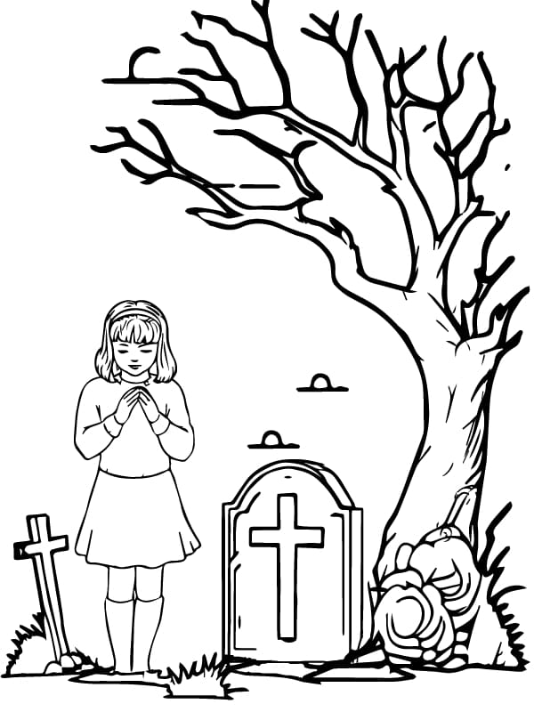 Seorang anak kecil berdoa berdiri di depan Salib Natal