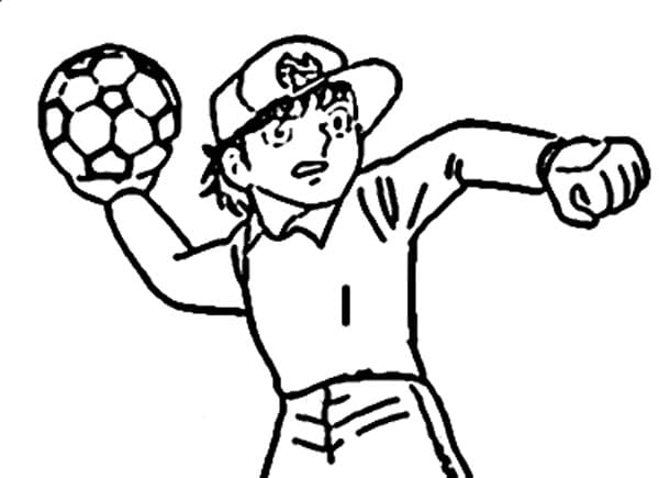 Tsubasa memegang bola